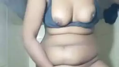 Horny Desi XXX girl licking her sweet boobs and fingering pussy MMS
