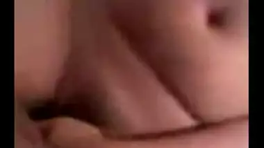 Hot Indian girl puts a condom on lover’s dick before sex